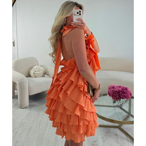Salmon-coloured ruffled backless dress