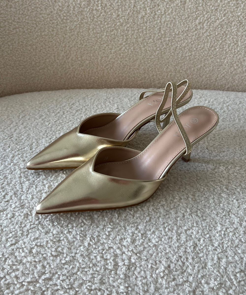 Gold pointed heels