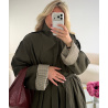 Long khaki trench coat with rolled-up sleeves and checked pattern