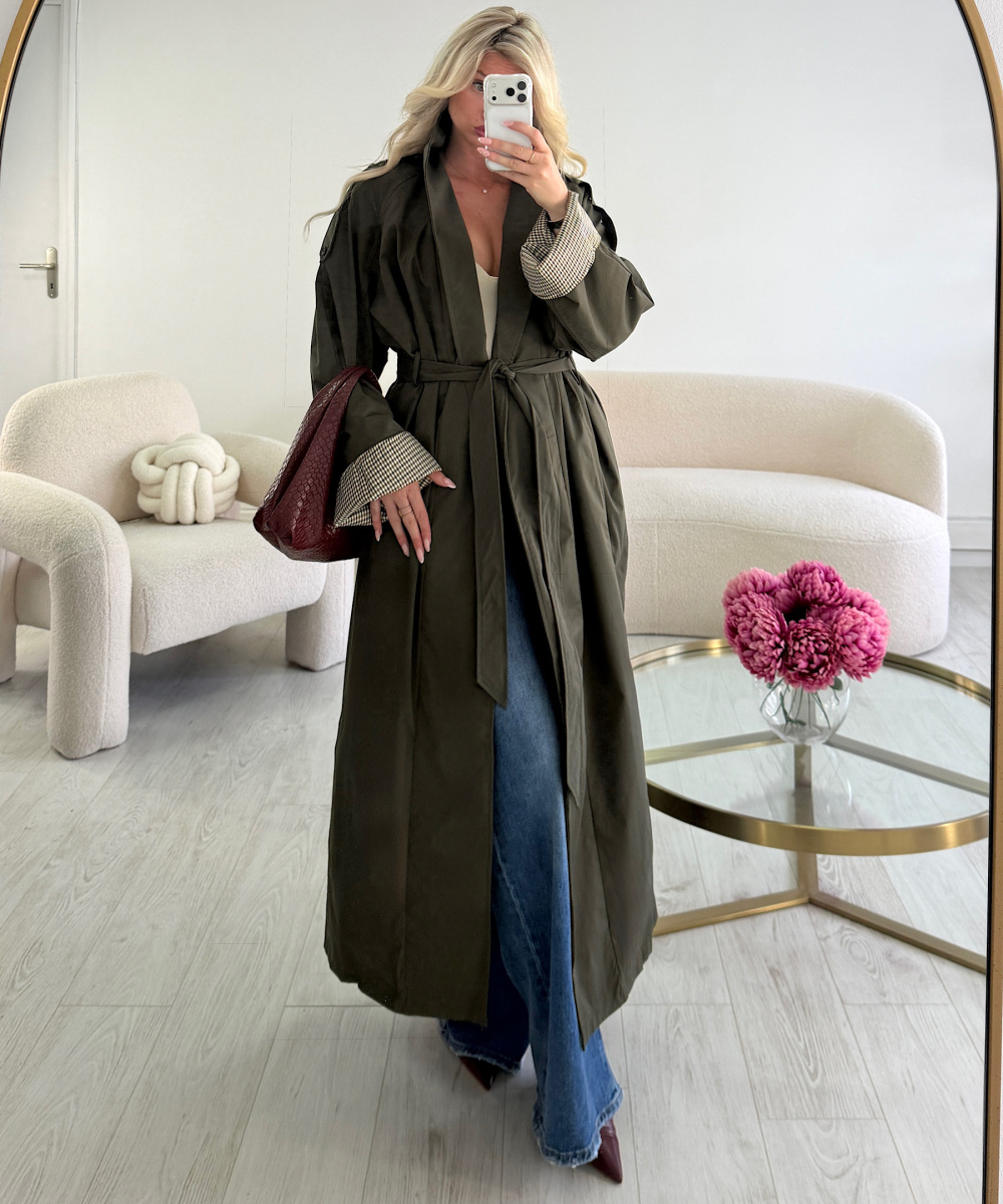 Long khaki trench coat with rolled-up sleeves and checked pattern